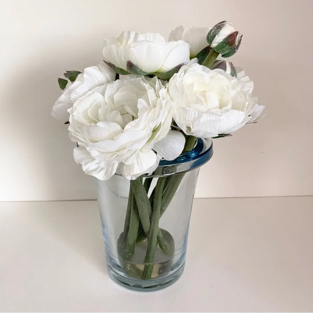 Thomas O’Brien Faux flowers in blue glass vase